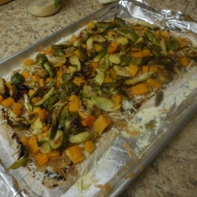 Top with squash and Brussels sprouts...
