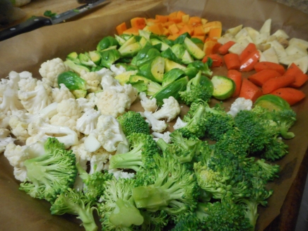 Arrange veggies on a baking sheet, drizzle with olive oil, sprinkle with salt and pepper.